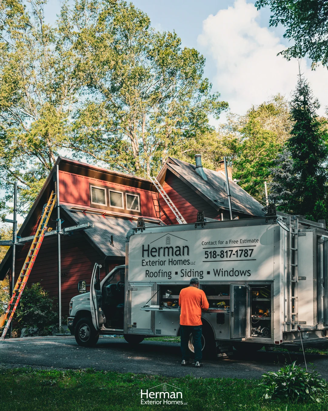 a man standing next to a truck