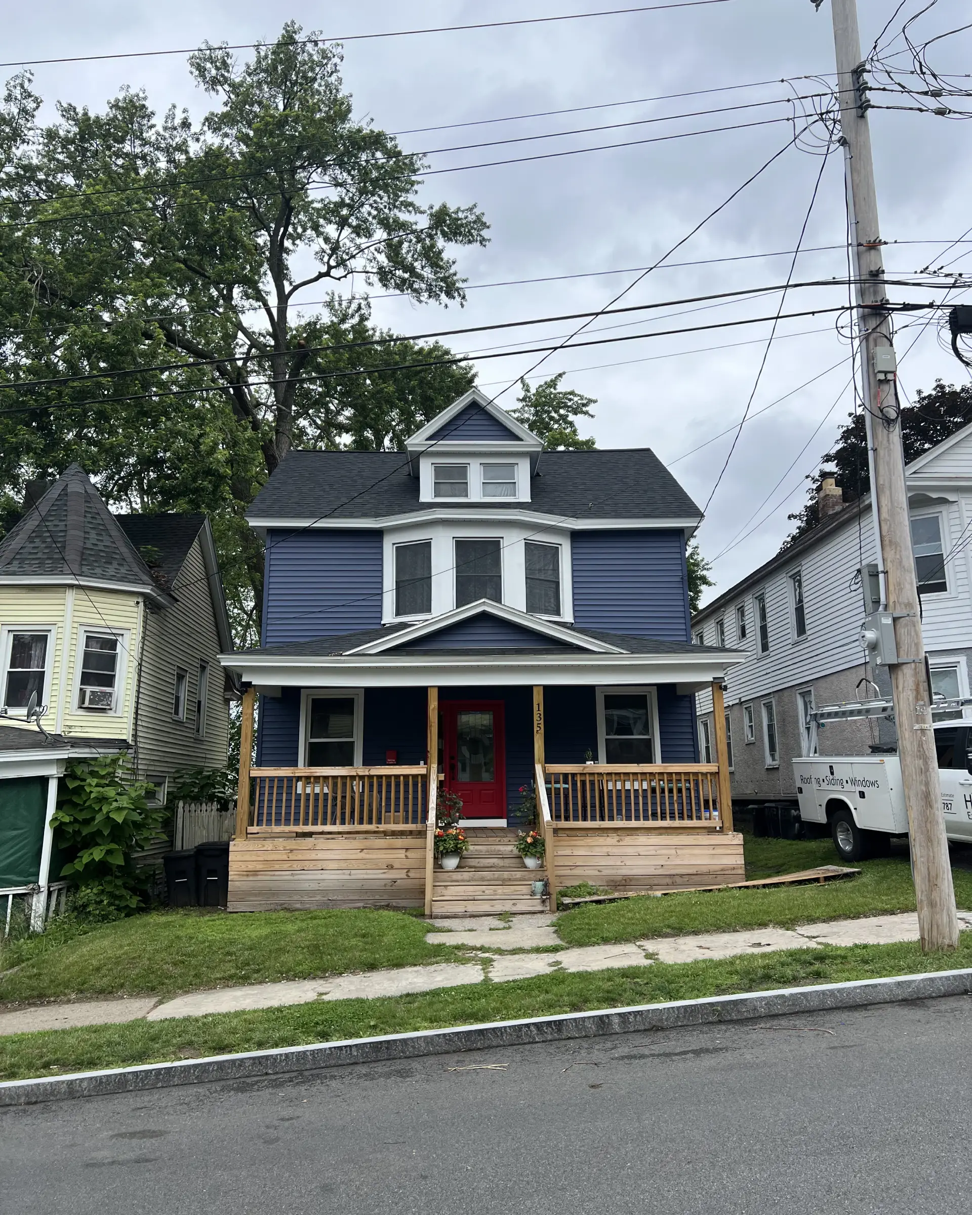 Vinyl Siding - Blue with Red Door - Far view.