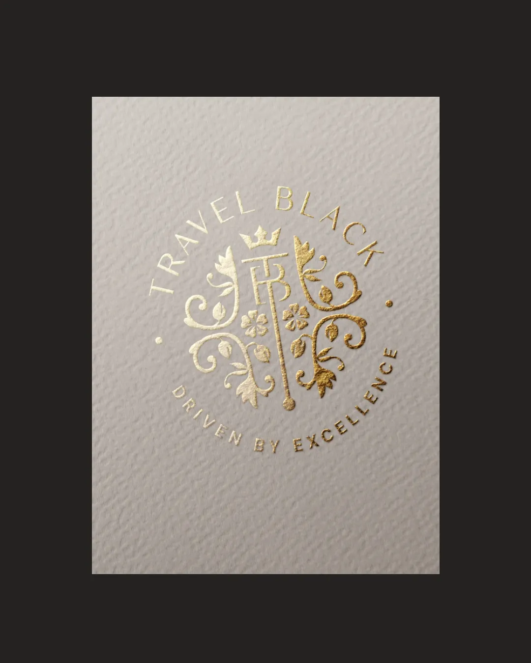 Gold embossed emblem on textured paper featuring a key with floral designs and crown, surrounded by text: Travel Black Driven by Excellence.