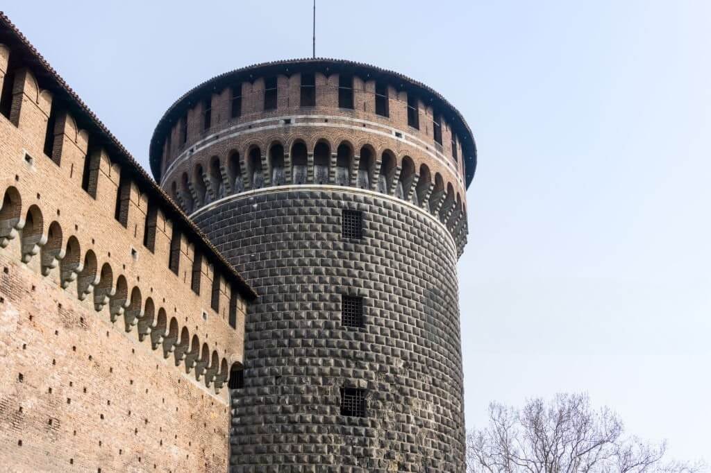 A modern castle symbolizing startup defensibility, mimicking protection of data moat for startups
