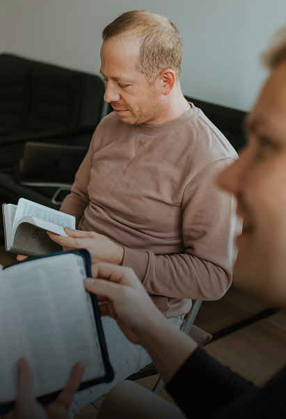 Two people attending a bible study