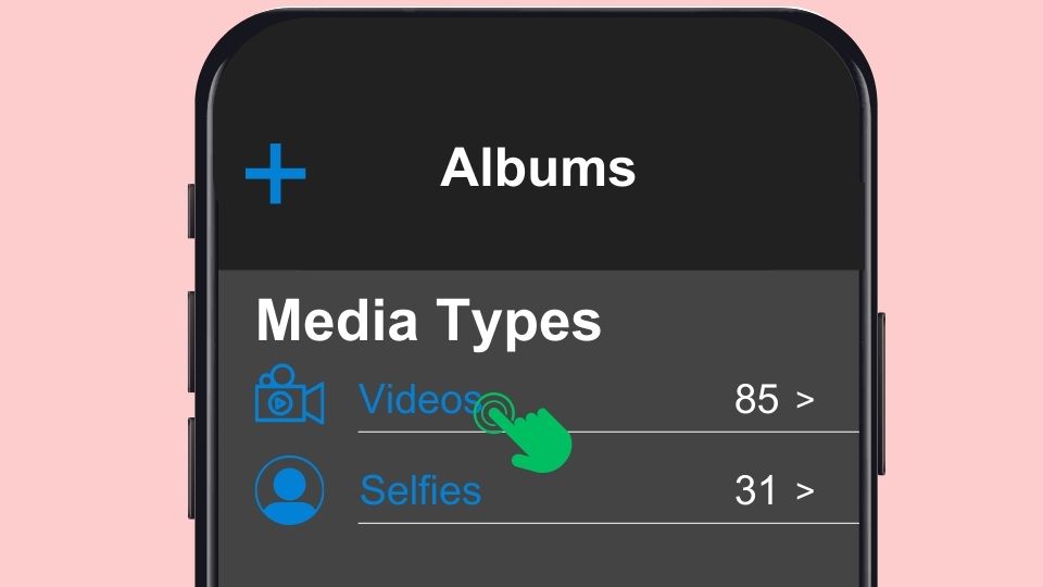 A green touch icon tapping the Videos folder on the iPhone's Photos app.