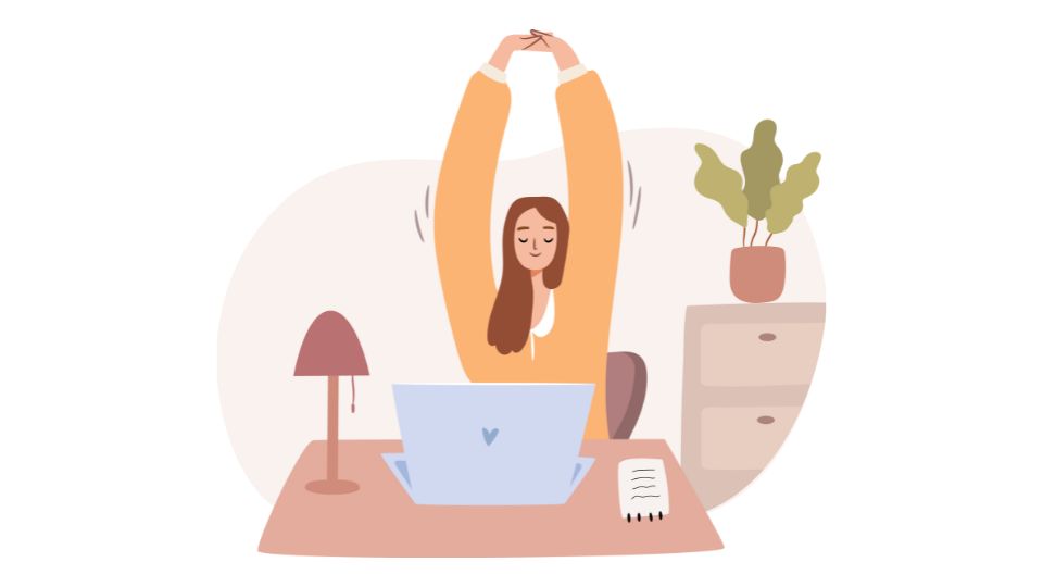 A woman stretching while at her desk on her laptop.