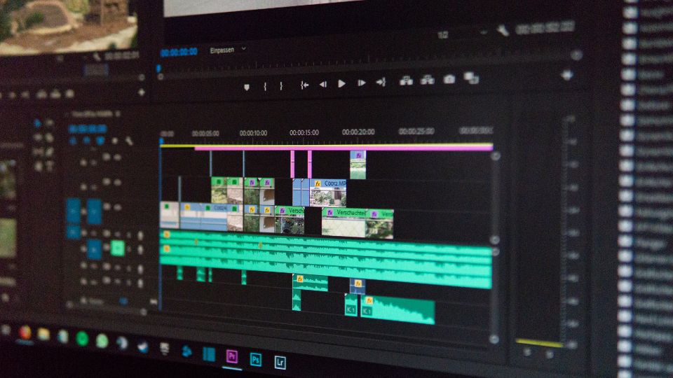 Adobe's Premiere Pro interface with multiple audio and visual files cut together.