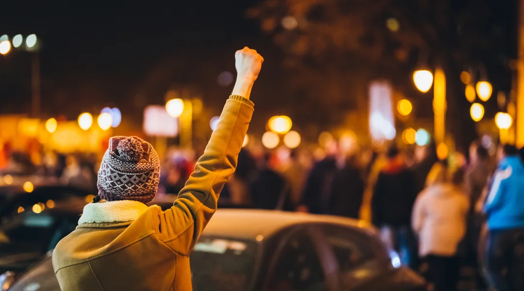 People protesting at night