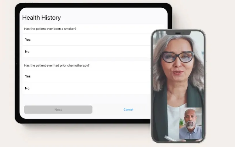 Tablet displaying a health history form with questions about smoking and prior chemotherapy beside a smartphone showing a video call between a woman and a man.