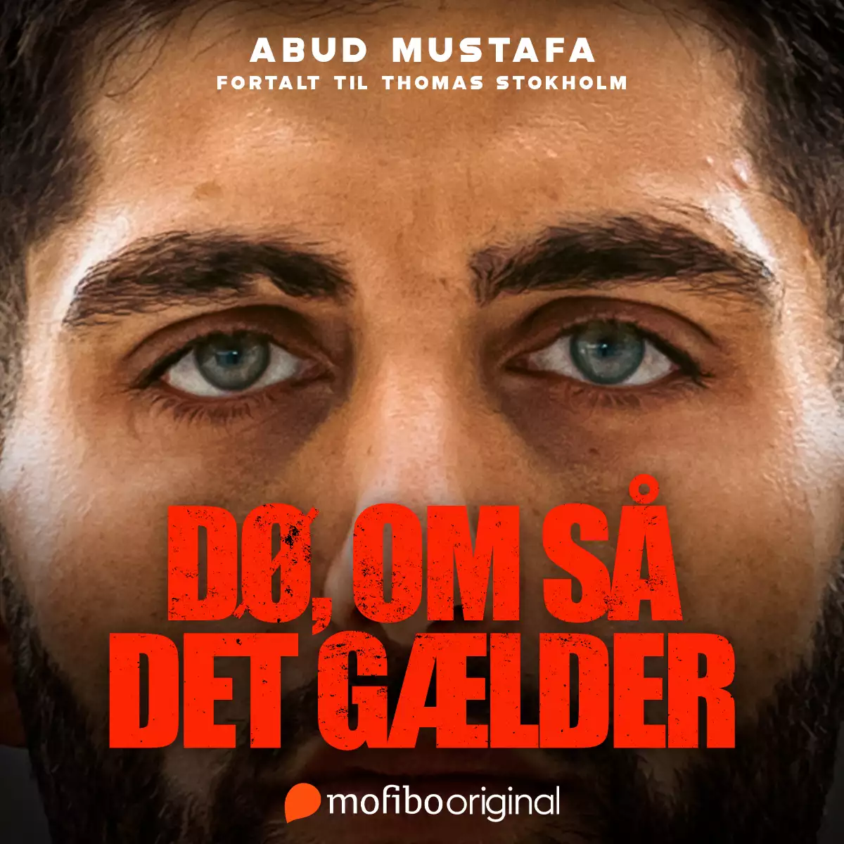 Nærbillede af en mands ansigt med blå øjne og tekst DØ, OM SÅ DET GÆLDER i rødt.