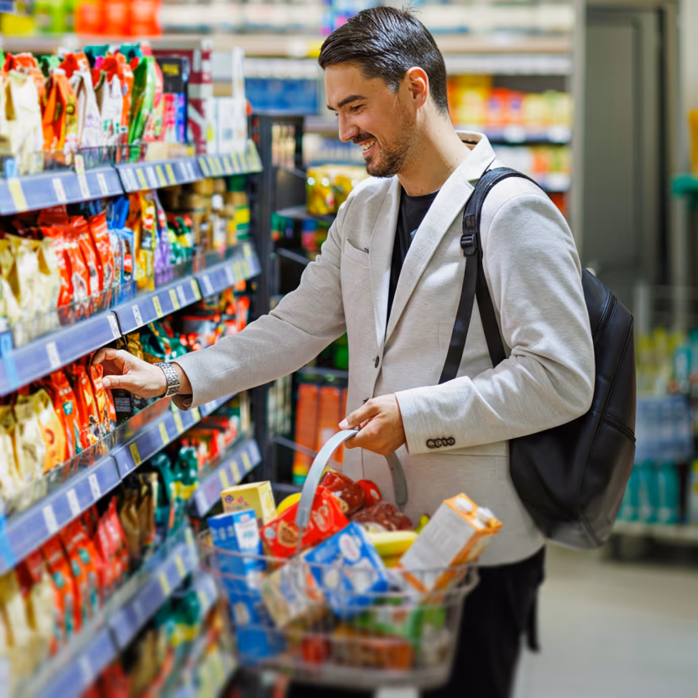 a photo of a man in a convenience store doing grocery shopping