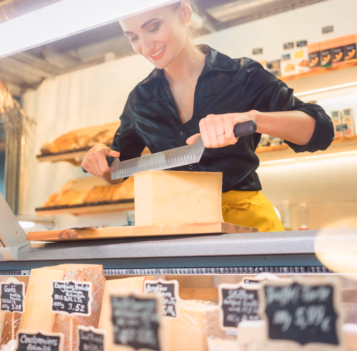 a worker at a specialty food store