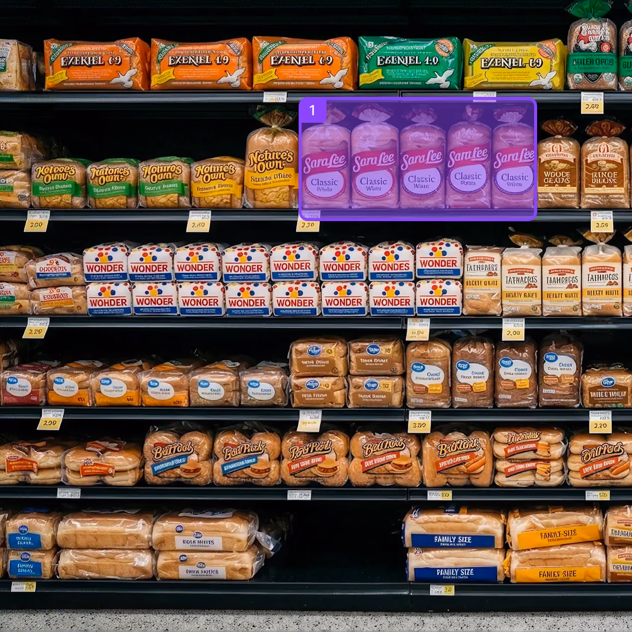 Shop assistant scanning a packaged food item with a barcode scanner in a grocery store aisle.
