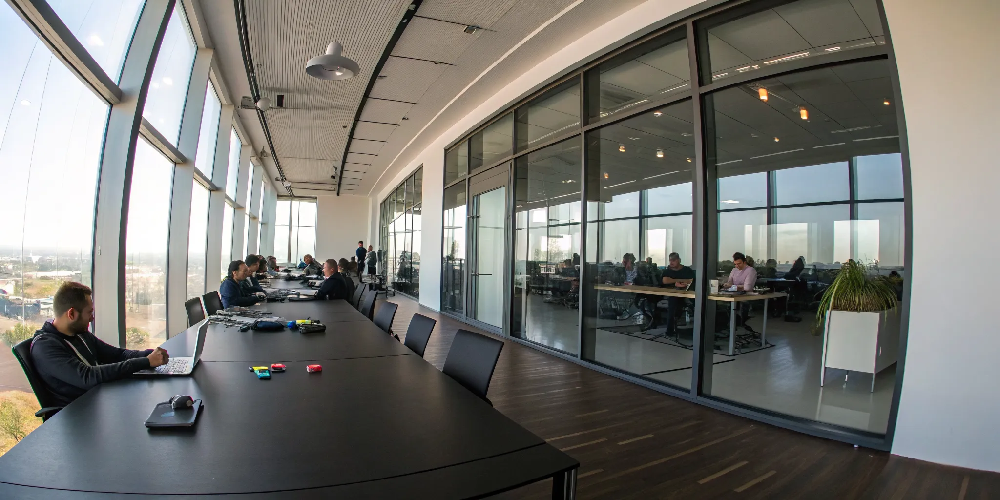 Teams collaborating on a game inside a modern AAA co-development studio.