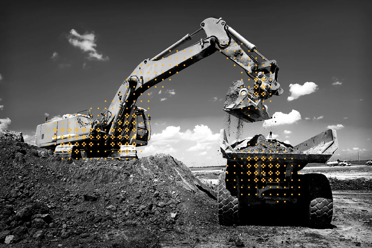 excavator on top of a dirt hill moving dirt from another truck shown in black and white colors with yellow decorative glyphs highlighting both machines