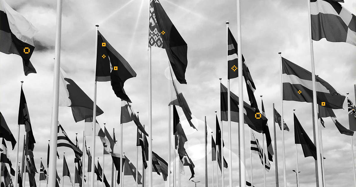 black and white image of several national flags with yellow glyphs