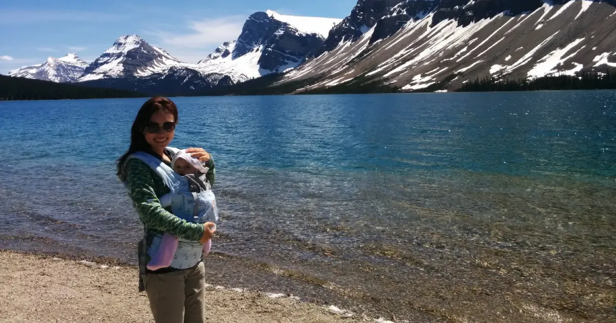 Shell Zhang and Daughter next to a glacial lake