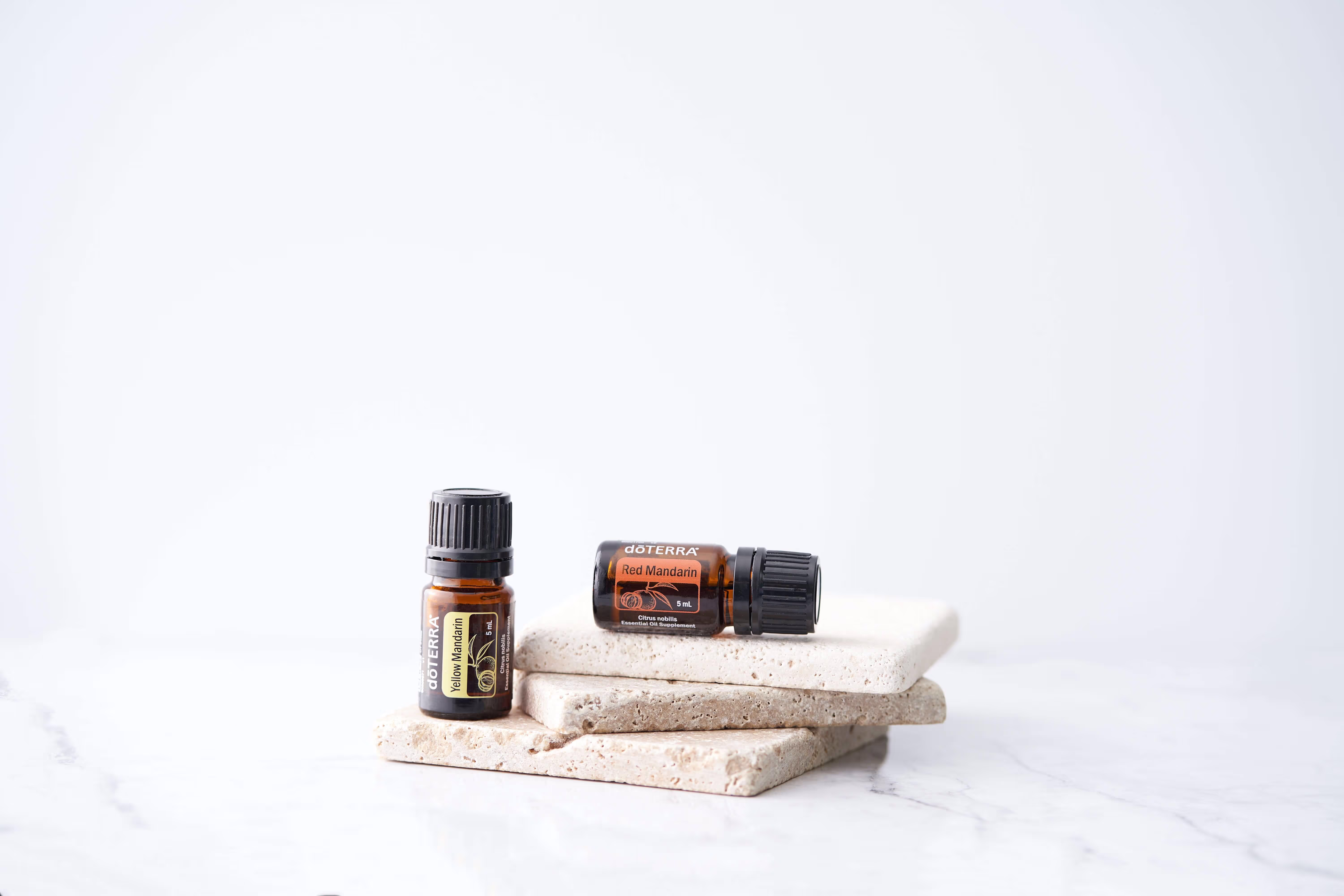 a photography of a couple of doTerra bottle oils