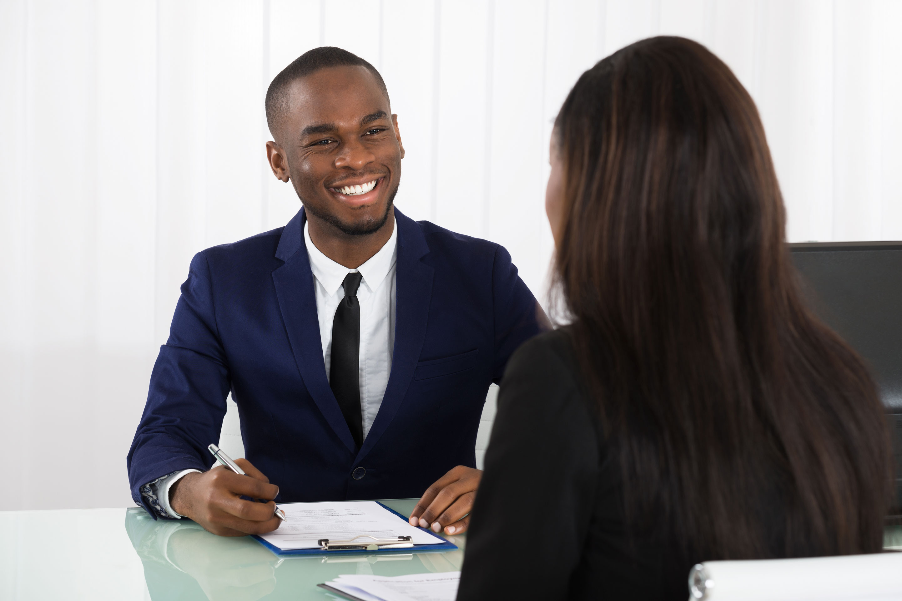 Women interviewing for a job.
