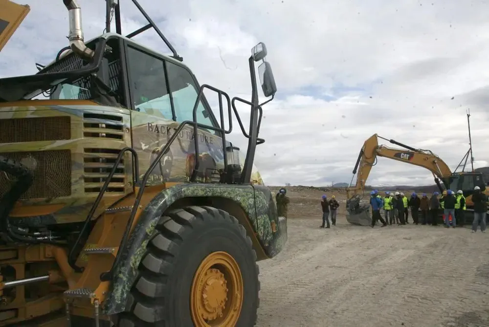 Steer Remote-equipped haul truck and excavator during live field demonstration with operators