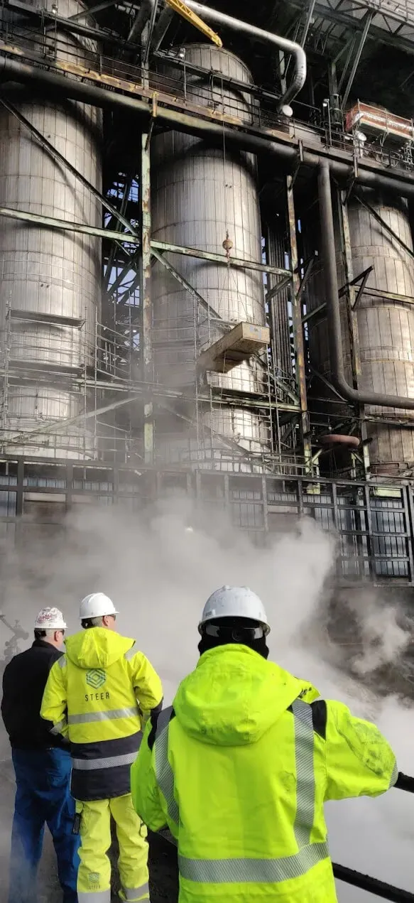STEER crew performing industrial cleaning and demolition with heavy steam at Flint Hills Minnesota

