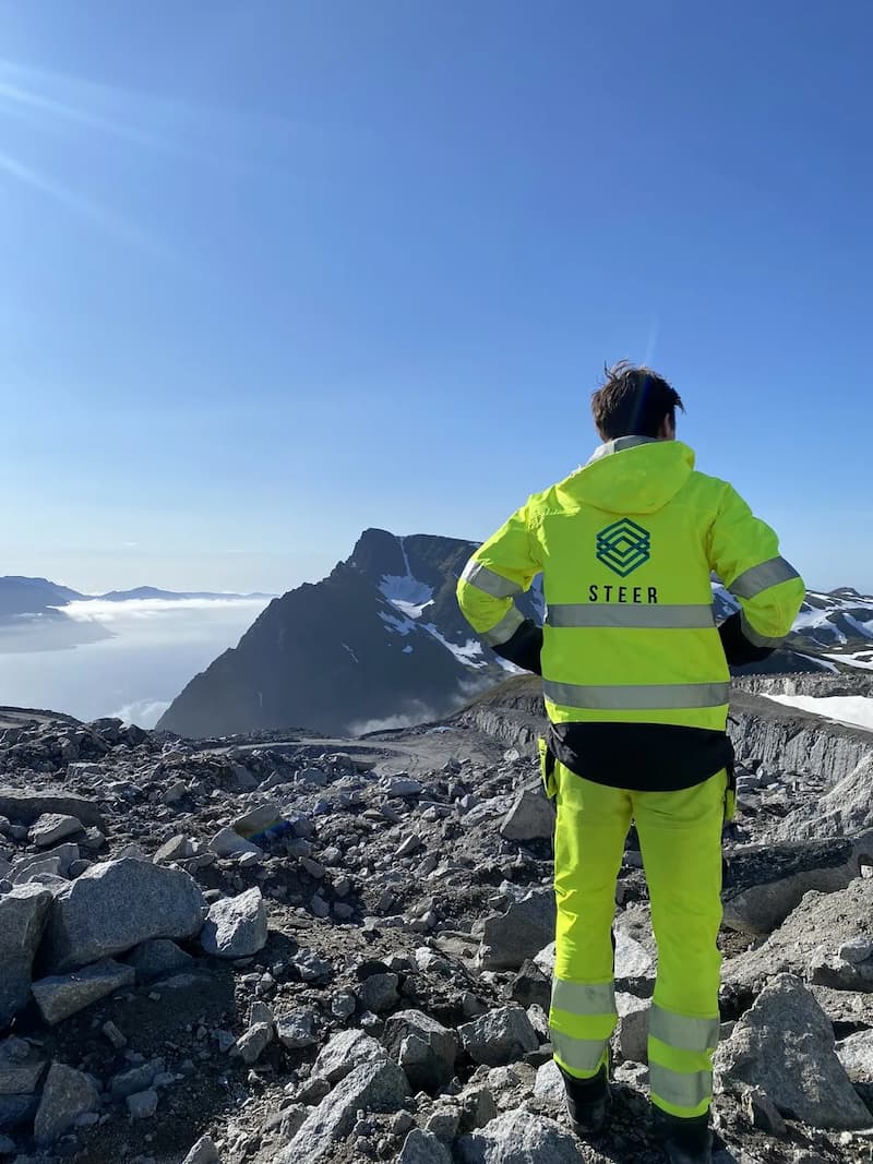 Steer engineer overlooking mountain quarry landscape at Sibelco remote operations site