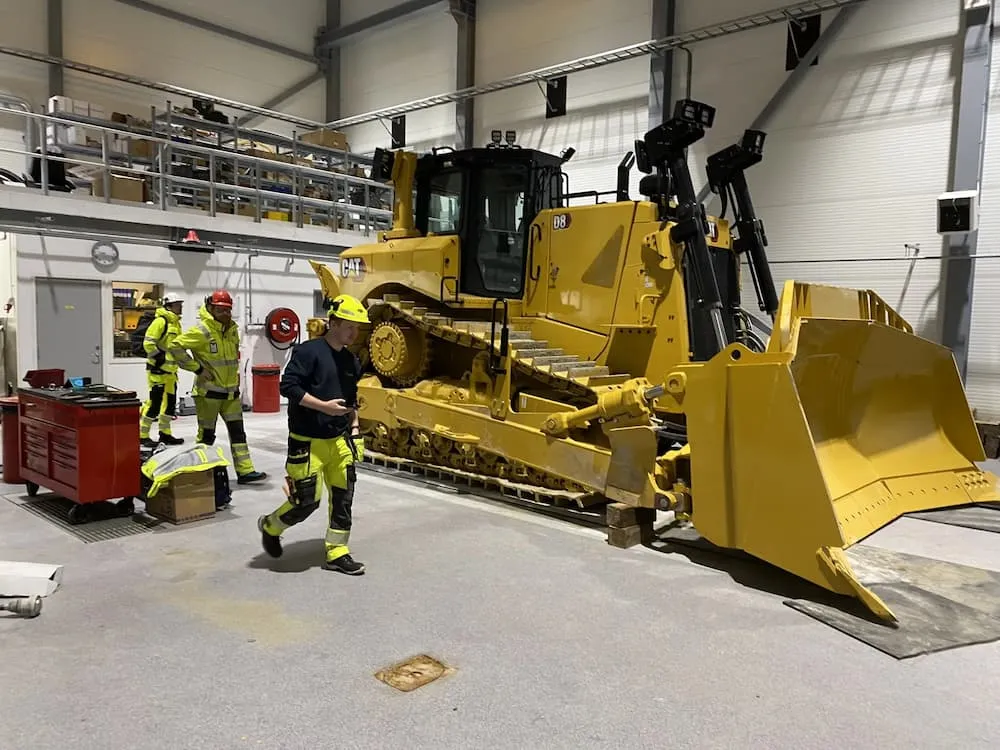 CAT D8 dozer in service workshop during remote control setup at Sibelco site