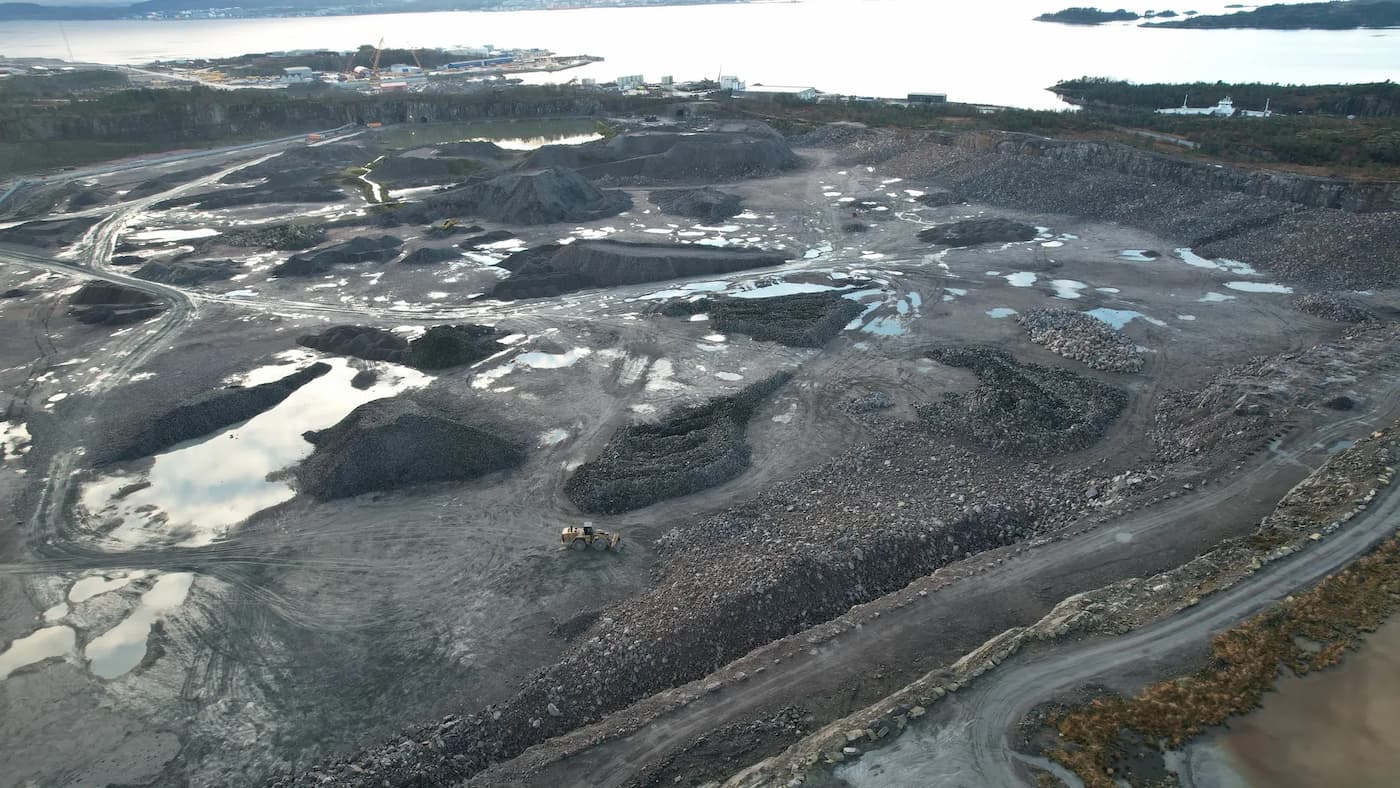 Technicians configuring remote operation system on CAT D8 dozer