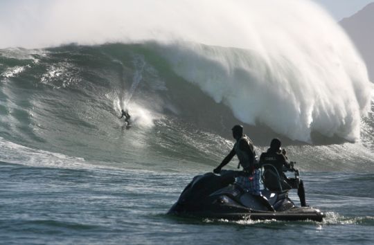 Videographer Neil Webster and jet-ski pilot jeremy "Hutch" Phillips get into position to capture a local big wave charger © rebelsessions.com 