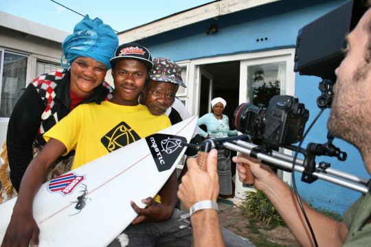 Family affair: Lungani Memani and his parents – Tiny and Noveg – during filming at their Port Alfred house yesterday. Picture: David Macgregor / Daily Dispatch