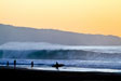There is no feeling like walking up the beach after a fun surf and having a gander at building swell unloading on the Hawaiian reefs. Photo: Sasha Specker/
