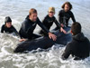 Finding it impossible to get the whales into deep water, all they could do was keep the whales calm and wet. Photo: Ross Frylinck