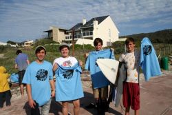 Stoked winners with their loot at Long Beach. Photo Chris Mason