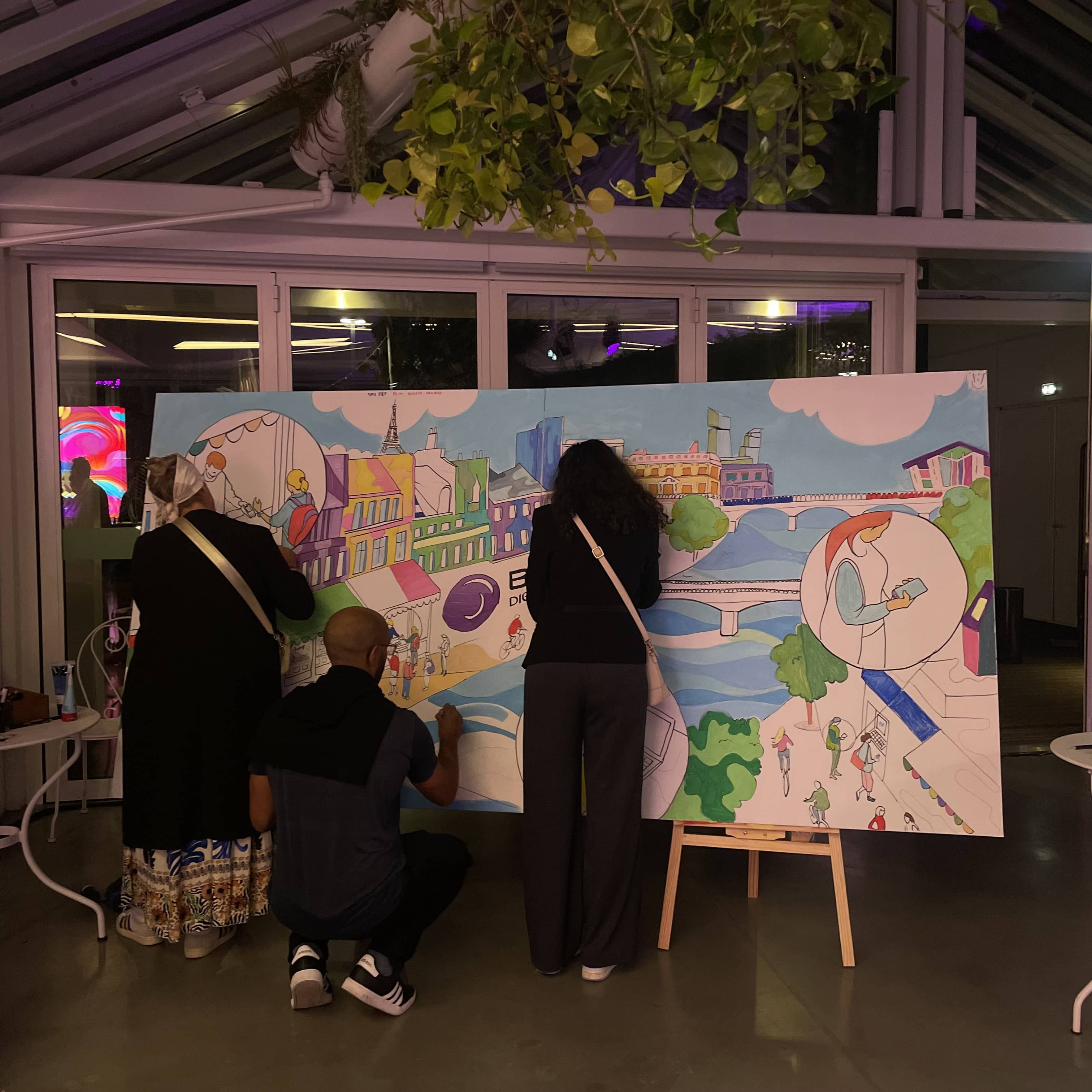 La fresque collaborative réunit les équipes autour de la création d’une œuvre géante, où communication et cohésion sont clés pour harmoniser esquisses et couleurs sur plusieurs toiles.