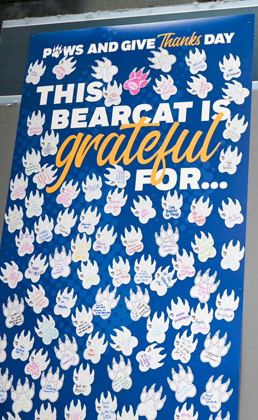 Wall of thank you notes in the shape of a bearcat paw