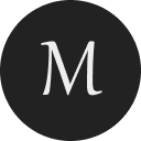 Museo logo with white M on black background.