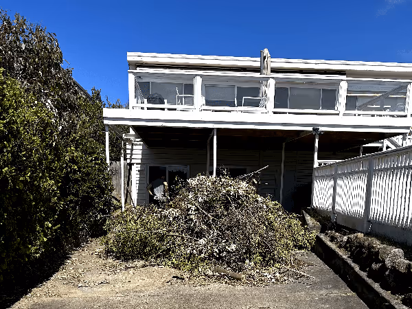 Green & Garden Waste in front of a house