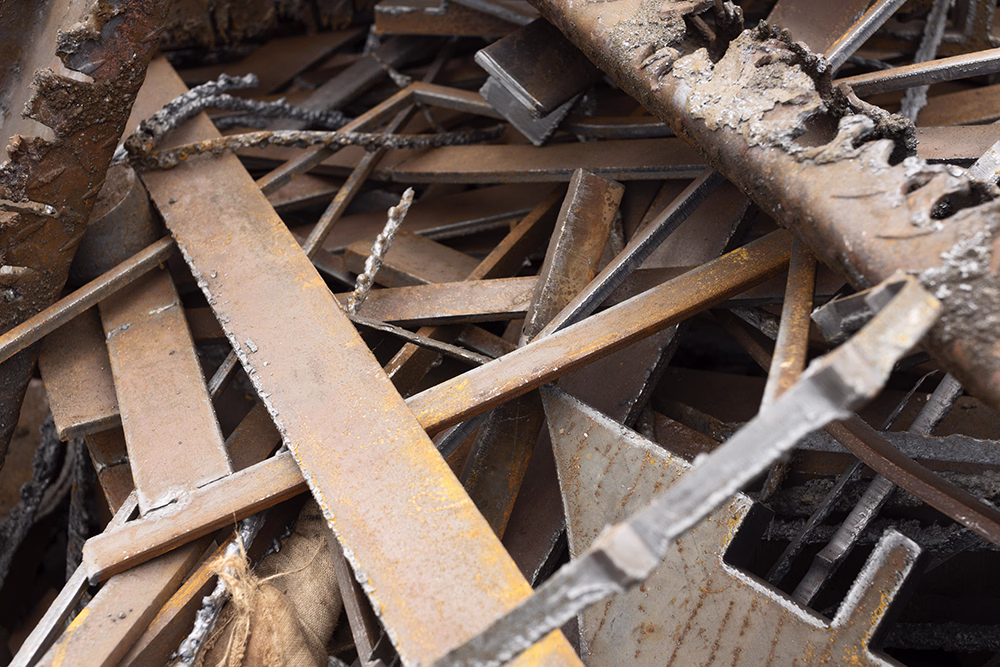 Pile of old timber, mails and other strip out debris