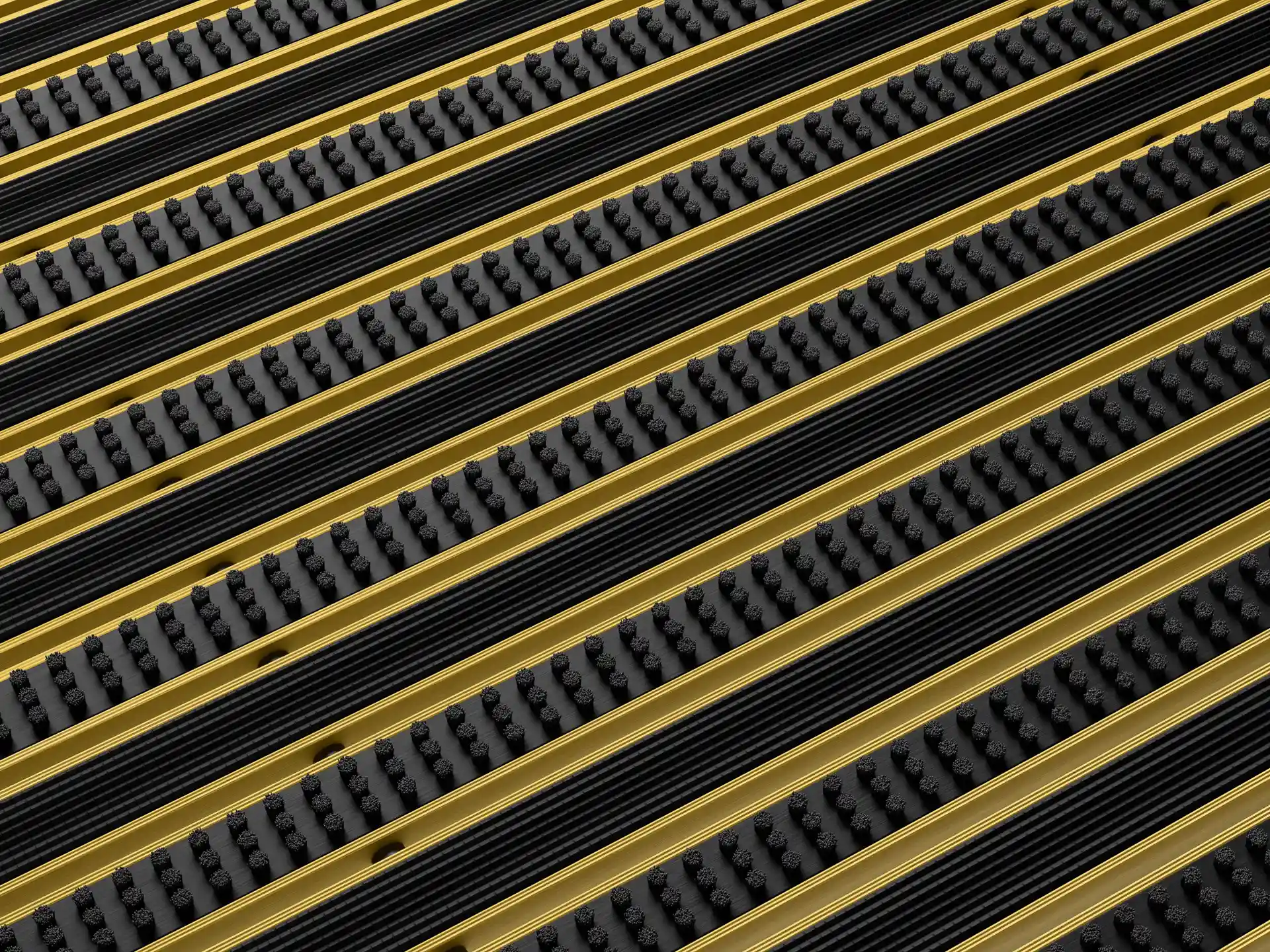 Detail einer goldenen Aluprofil Fußmatte mit abwechselnder Bürsteneinlage und Gummieinlage