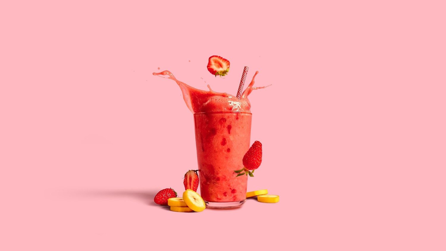 The smoothie as shot on a pink wall