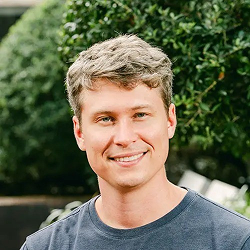 a headshot of Chris Ellis