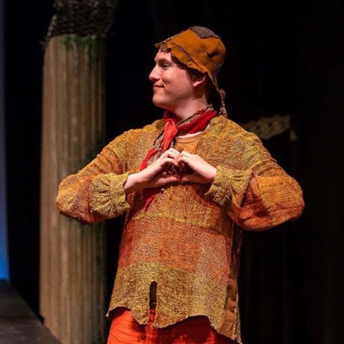 Matt Fama acting in a play.