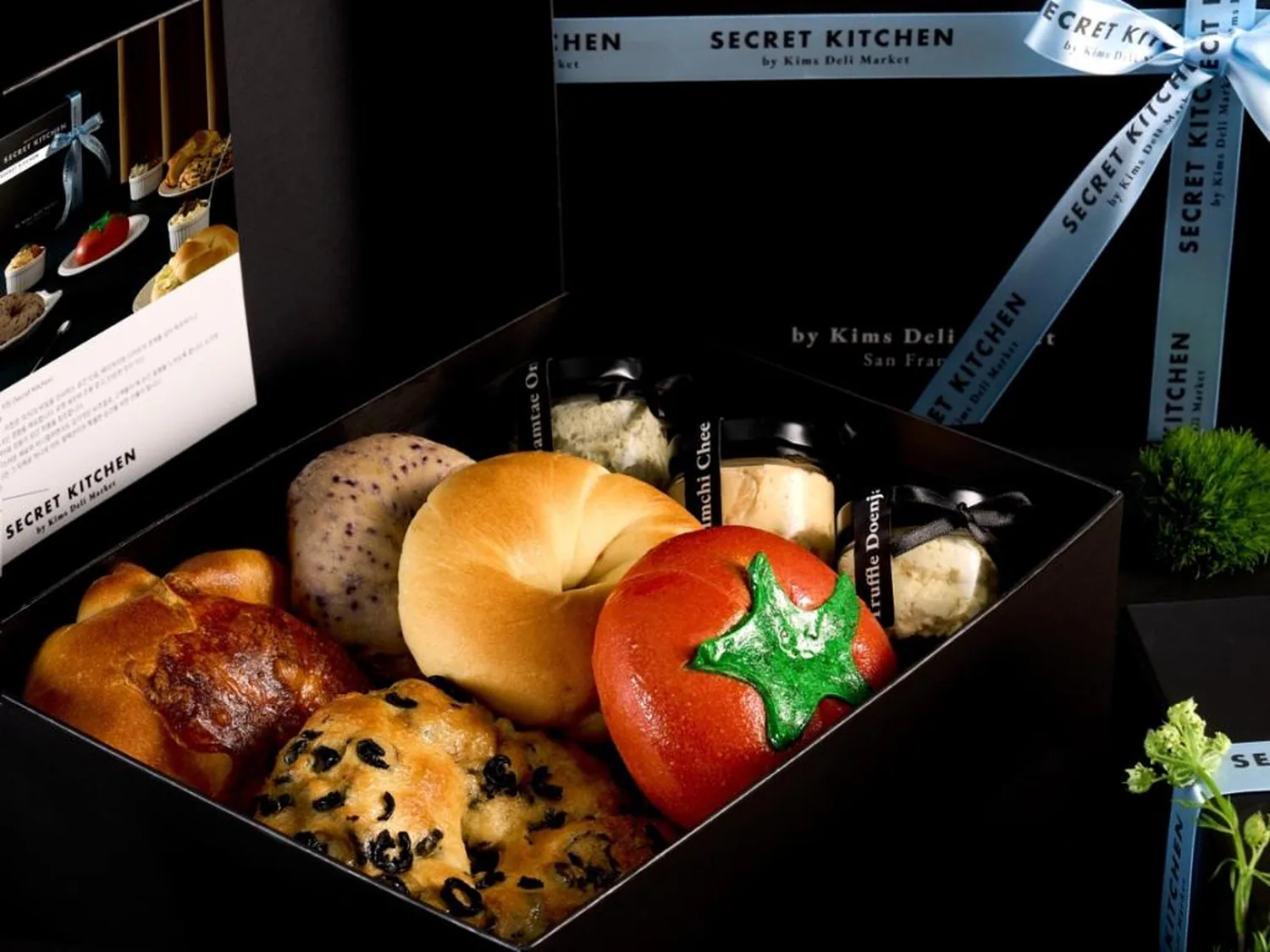 Secret Kitchen branded gift box with artisan breads and Korean condiments.