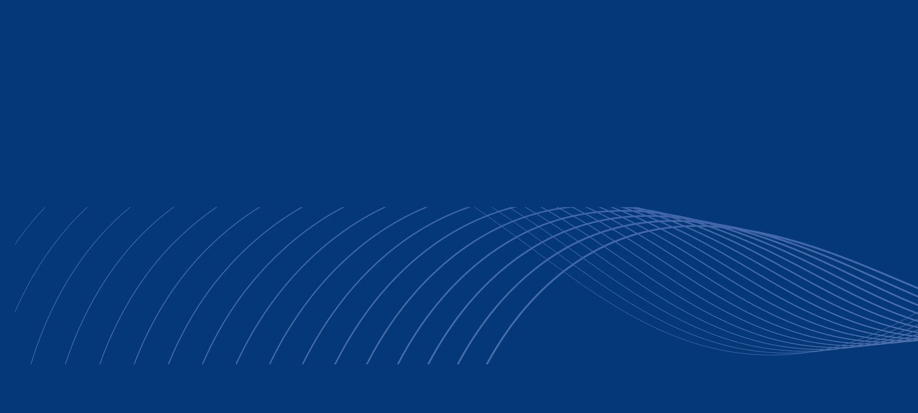 Ein Flugzeug, das vor blauem Hintergrund in der Luft fliegt