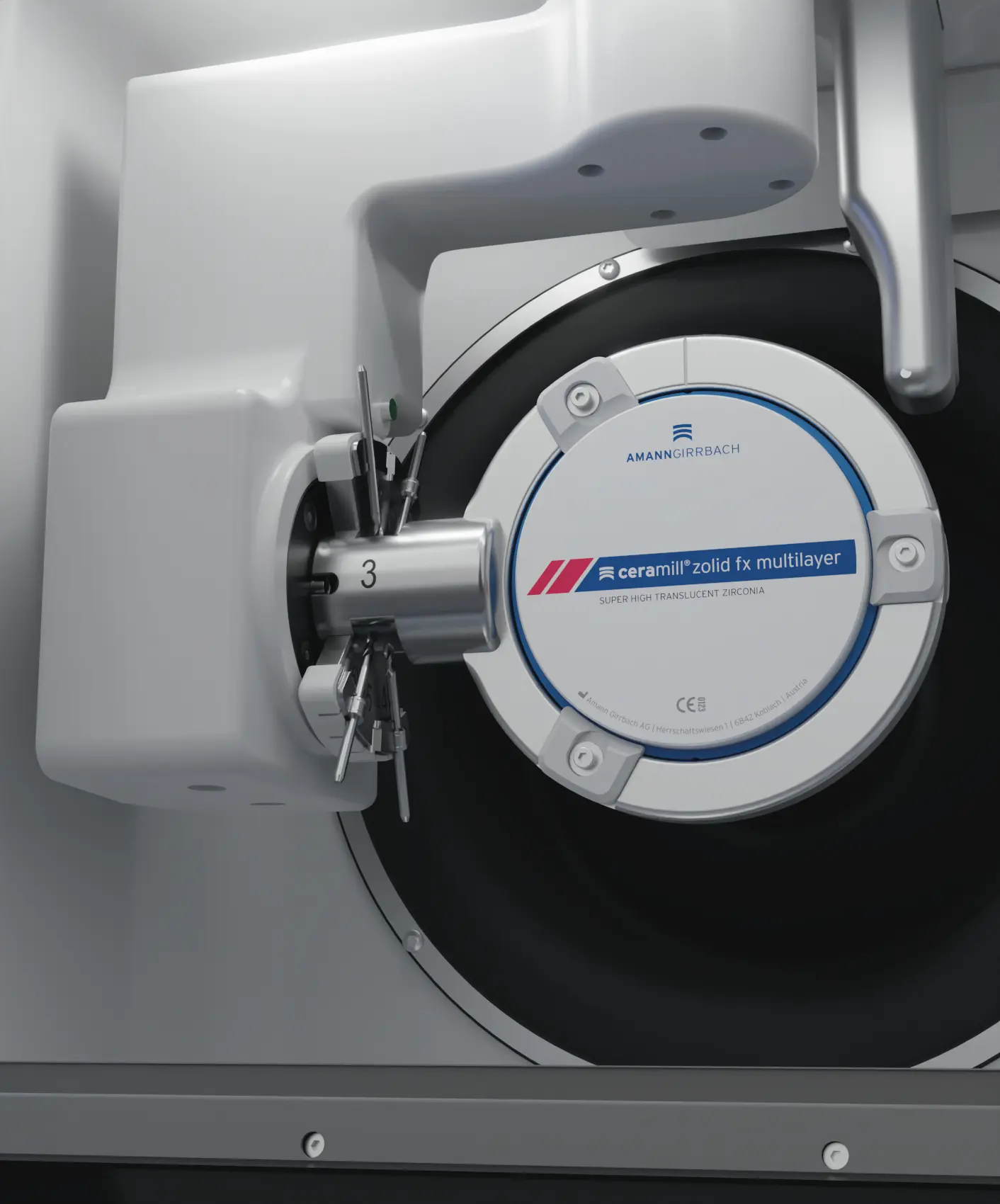 Close-up of an Amann Girrbach Ceramill milling chamber holding a zirconia disc