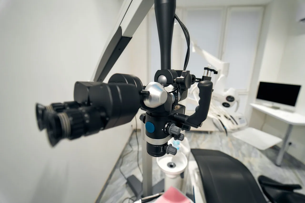 Dental operating microscope over a treatment chair