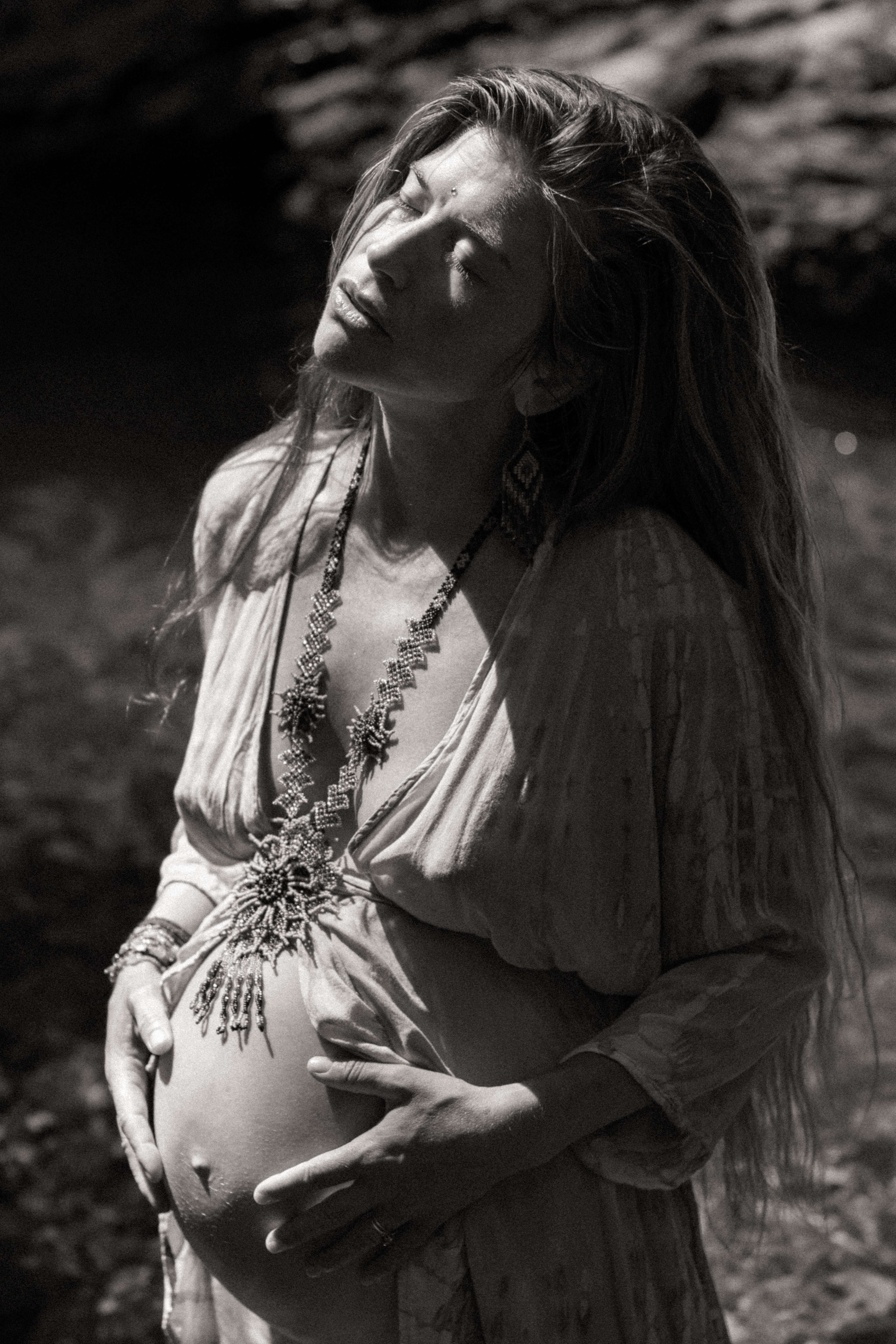 Magical maternity photoshoot with waterfall and nudity