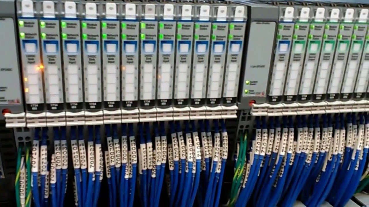 PointIO - rack displaying digital input and output modules separated by a power supply unit