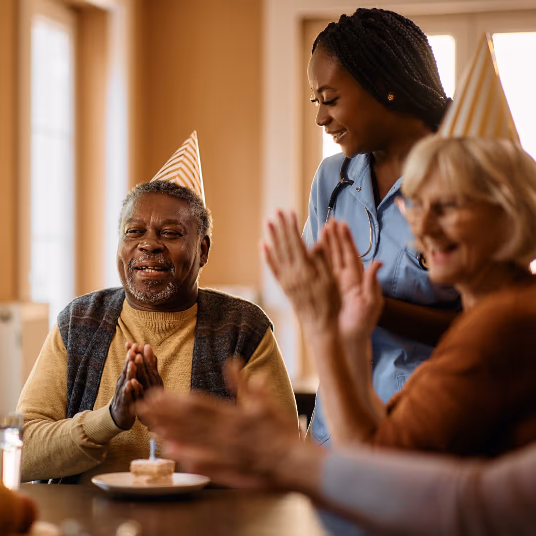 Caregiver celebrating with her client.