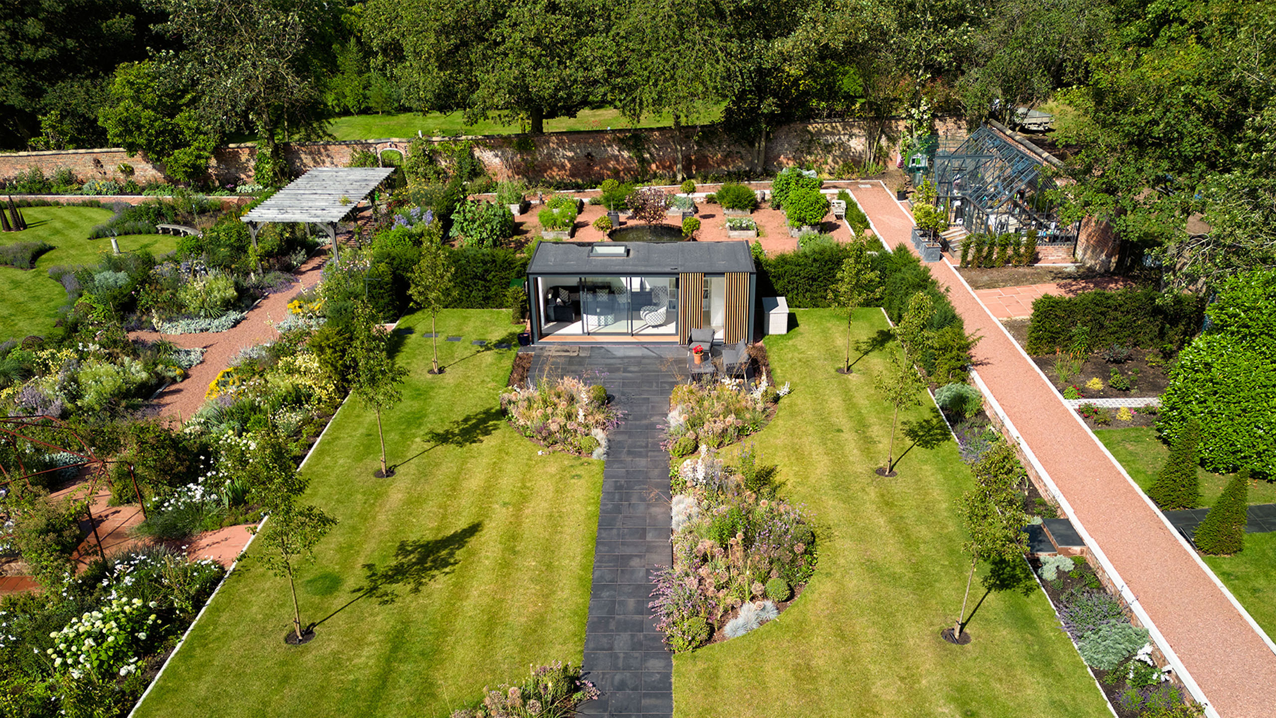 6.	Pod Space modular Garden Pod surrounded by trees and soft landscaping