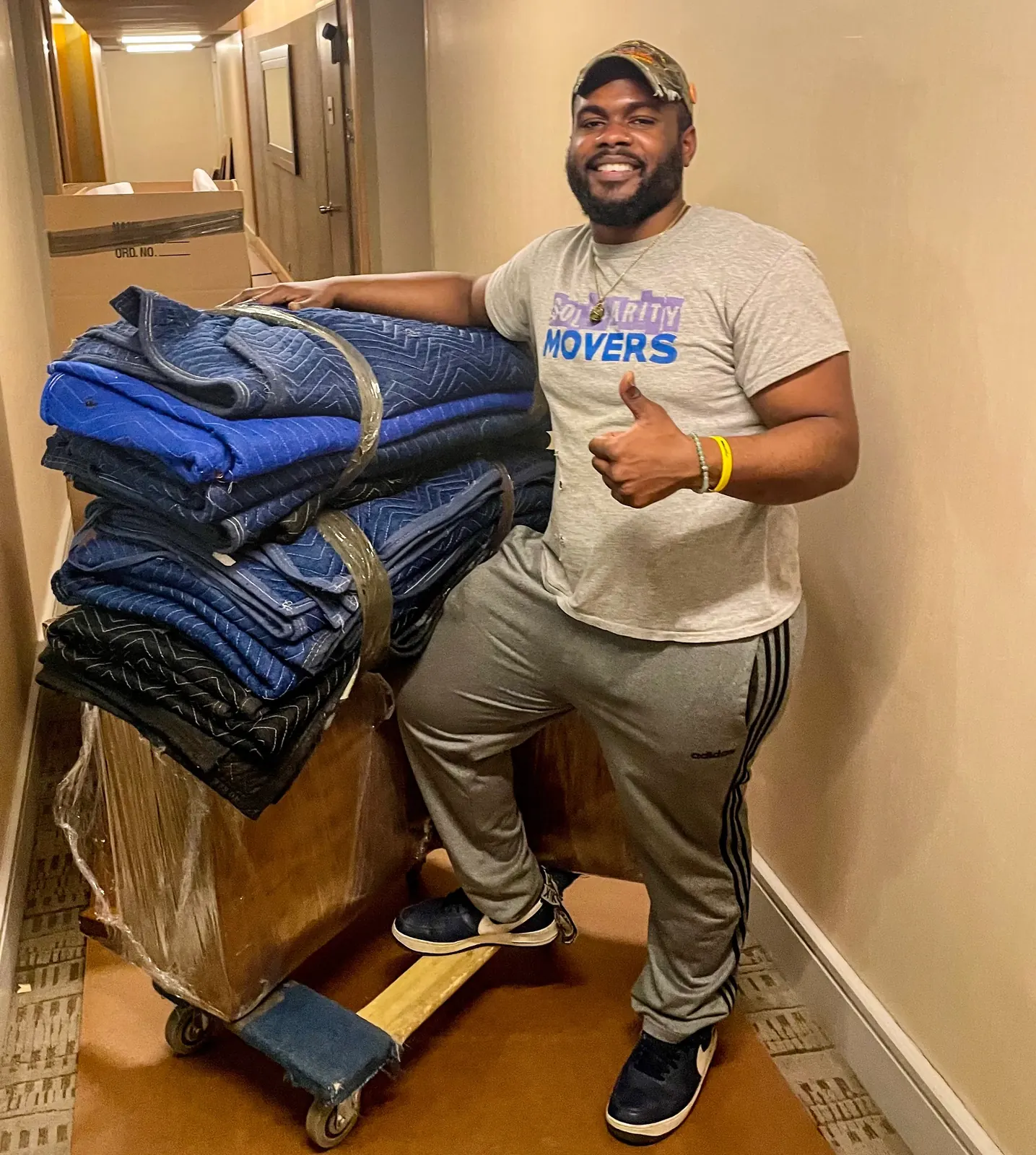 NYC moving team carefully handling customer belongings during relocation