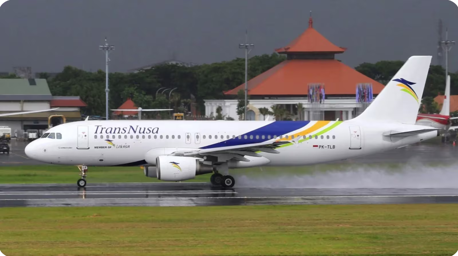 A Transnusa airplane on the tarmac in Indonesia