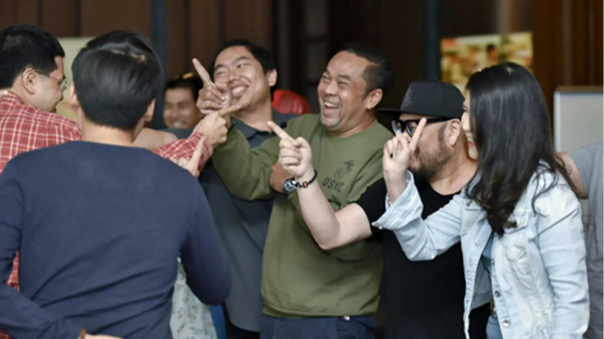 Participants laughing during a Viva Creative Studio workshop